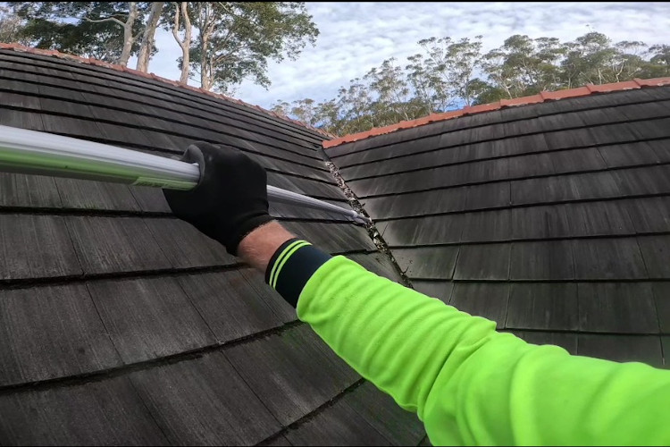 
Employing extended poles for meticulous gutter cleaning, leaving clean valleys on steep roofs in wollongong